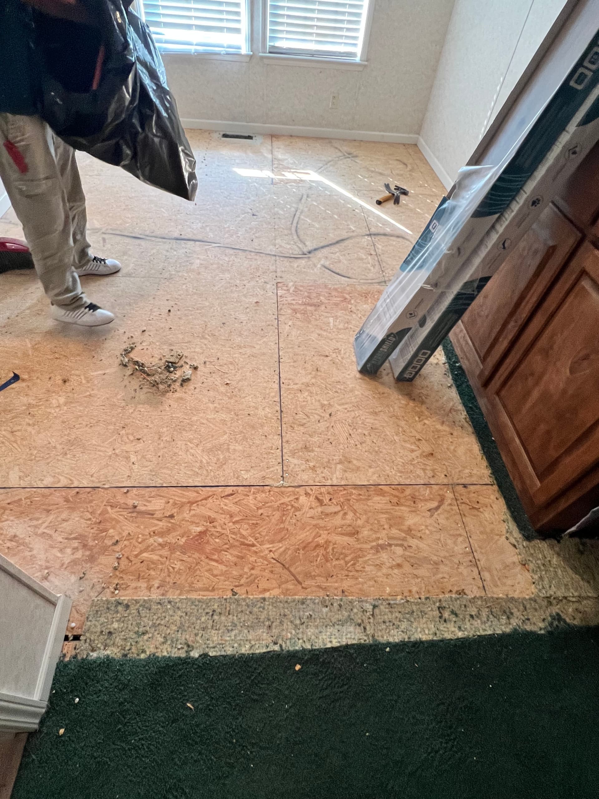 Gallery photos for Carpet to Laminate Flooring Plus a Full Kitchen Refresh: Image #1